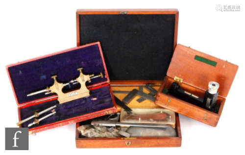 A 19th Century pocket watch tool lathe in fitted red leather case by Tour A Pivoter, with a spirit level in a mahogany box and assorted gauges. (qty)