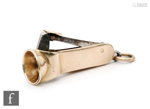 A 9ct gold cigar cutter with suspension loop