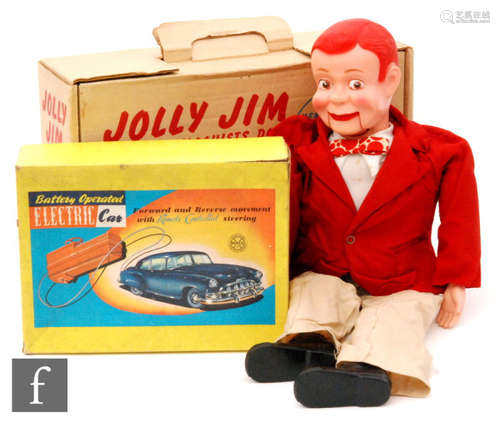 A Marx Battery Operated Electric Car, tinplate body in blue and white with remote control, boxed, together with a Jolly Jim ventriloquist doll, boxed. (2)