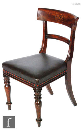 A 19th Century mahogany bar back dining chair inlaid with a marquetry monogram with the initials C & H (Chester and Holyhead Railway) with overstuffed seat on turned legs to the front.
