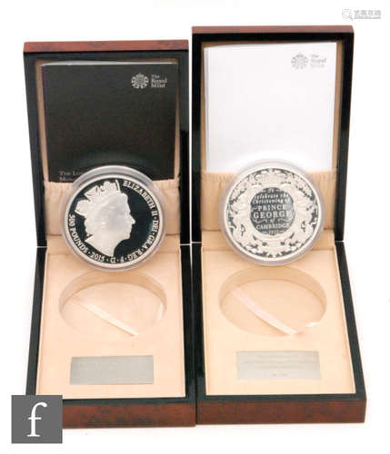 Elizabeth II - A 2013 silver kilo coin to commemorate the christening of HRH Prince George and a 2015 silver kilo coin for the longest reigning monarch, both cased with certificates (2)