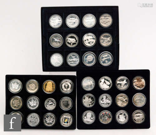 Elizabeth II - Thirty six silver and nickel crowns to include Aircraft of the World, Canada and other subjects in three trays (36)