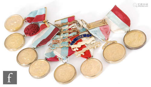 A collection of eight Masonic gilt enamelled charity jewels all with ribbons and three with bars, dating from 1939 to 1969, various recipients. (8)