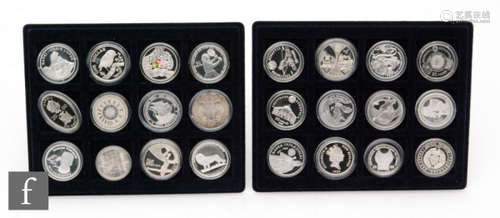 Elizabeth II - Twenty four assorted silver and nickel proof coins New Zealand, Russia including various subjects and a Maria Theresa dollar in two trays (24)