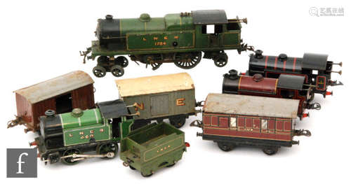 Four O gauge Hornby clockwork locomotives, a No. 2 Special Tank Locomotive 4-4-2T LNER green '1784', an 0-4-0T BR black '82011', an 0-4-0T LNER green '460' and an 0-4-0T LMS maroon '2270', together with an LNER tender and three items of rolling stock, all unboxed and playworn. (8)