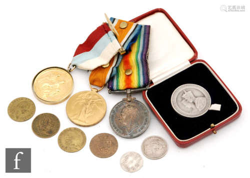 Netherlands - A 1792 two Stuivers silver coin, a 1966 two and half Guilders, a silver Islamic coin, a cased coronation medal, also a pair of World War One medals awarded to 261630 Gnr C.C Nash and a Masonic institute medal (7)