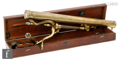 A 19th Century brass telescope by I Ramage Aberdeen on folding tripod base with accessories in a fitted mahogany case, length 74cm closed.