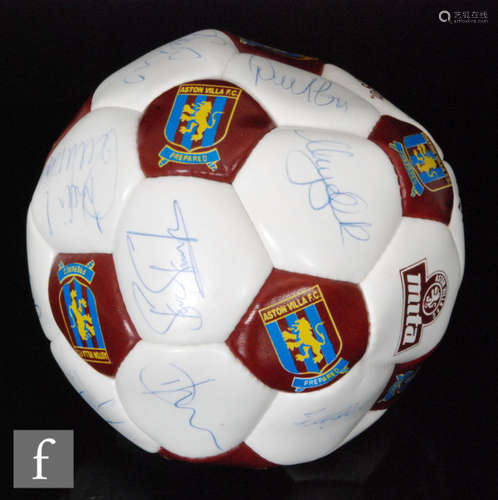 An Aston Villa football signed by previous stars including Steve Staunton, Dean Saunders, Paul McGrath, etc.