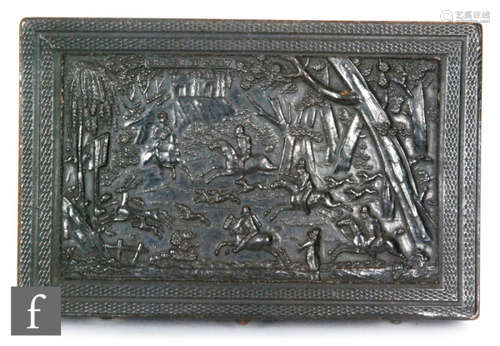 A French musical snuff box playing two airs, 6.5cm cylinder in ebonite case with a hunting scene beneath a castle titled Chasse Au Gere, width 9.5cm