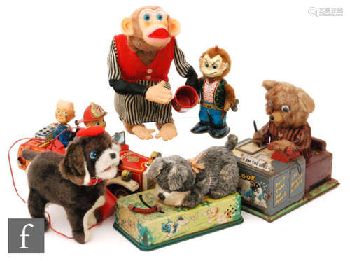 A collection of Japanese tinplate and plastic toys to include a Nomura Playful Puppy, a Cragstan Crap Shooting Monkey, a Yonezawa Walking Monkey Cowboy, a Linemar Busy Secretary and three others, A/F. (7)