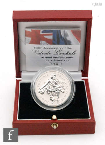 Elizabeth II - A 2004 five pound platinum Piedfort coin, No 136, cased with certificate.