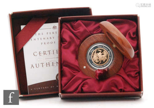 Elizabeth II - An 1899-1999 Perth mint centenary sovereign in teak case with certificate and presentation box.