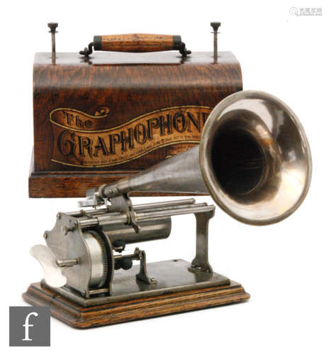 A Graphophone type Q phonograph, key wind operation with reproducer and key with small witches hat type horn, oak case on plinth base, width 26.5cm