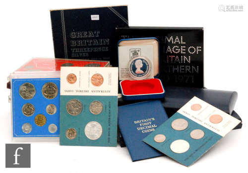 Elizabeth II - 1972 Jersey and Guernsey Royal Wedding proof coin sets, an Israel specimen coin set in a black wallet and various nickel and copper world proof coins, many contained in perspex cases (qty)