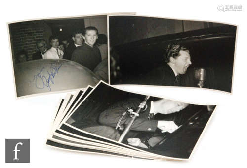 A collection of signed Jerry Lee Lewis photographs, to include eleven individual black and white photographs of JLL performing on stage in Birmingham, signed in blue ink, 8.5cm x 13.5cm. PROVENANCE: Acquired in person by the current vendor.