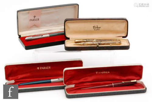 A Parker 17 maroon cased fountain pen, two 51 Parker classics and a Parker Duofold marble effect pen and pencil set, all cased. (4)