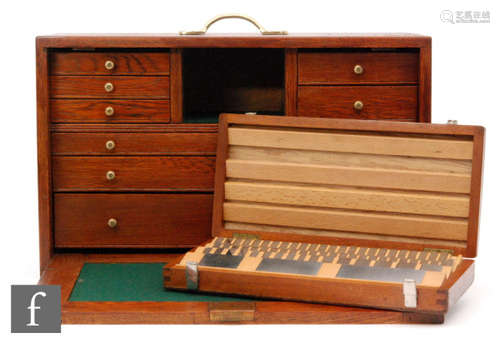 A mahogany fitted drawer engineers chest and a cased set of metric slip gauges. (2)