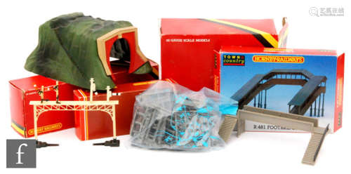 A collection of OO gauge Hornby accessories, mostly boxed, to include R180 Viaduct, R071 Modern Footbridge, R189 Brick Bridge,  R644 Point Motor, track, etc. Contained in three boxes.