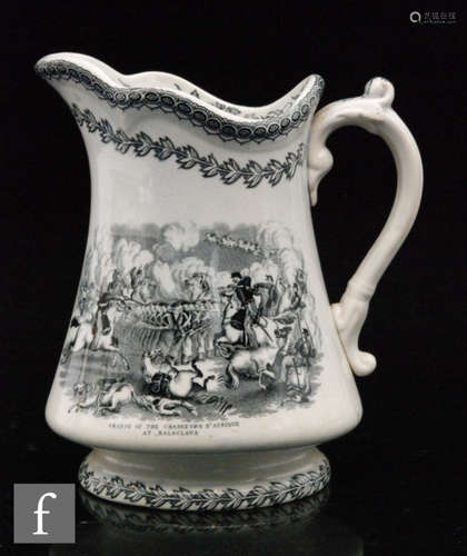 A Staffordshire Crimean War 'Charge of the Scots Greys at Balaclava' jug, of tapered form with scalloped rim, rising from a splayed base,  printed in monochrome with battle scenes on opposing sides, 18cm high.