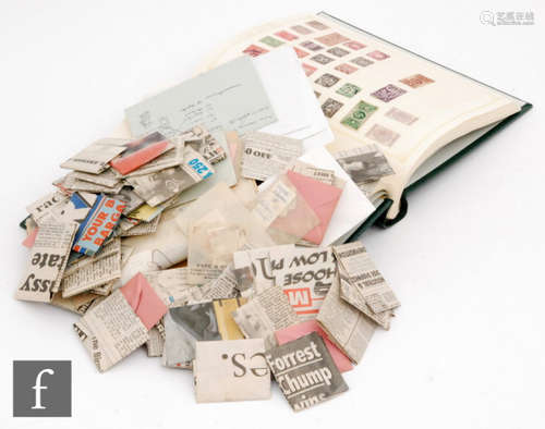 A world stamp collection contained in one album to include GB, Commonwealth and a quantity of loose stamps (qty)