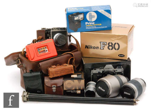 A Nikon F80 35mm camera, an Olympus om10 model, also a Reflex - Korelle flash gun and accessories (qty)