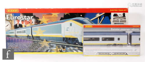 An OO gauge Hornby R1013 Eurostar train set, comprising Eurostar Class 323 power car with simulated pantograph, dummy car and two passenger saloons (lacking other accessories), together with a Hornby 4013 Eurostar coach pack containing two first class divisible passenger saloons, boxed. (2)