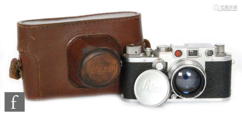 A Leica IIIf camera, serial number 526932 with Summiter f=5cm 1:2 lens with cap and associated case together an instruction book and a Pentax book (2)