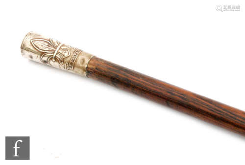 An early 20th Century Boy Scout cane with plated fleur de lys top 'Be prepared', length 77cm.