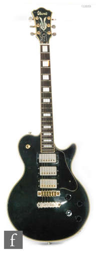 A 1978 Japanese Ibanez Performer PF230 electric guitar, three pick model, in midnight olive green, often known as the 'law suit guitar' due to the resemblance to the Gibson Les Paul.