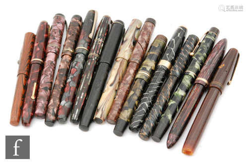 A Conway Stewart 27 fountain pen, another 14, a Universal pen, an Onoto, a Stephens, a Blackbird and eight other fountain pens in marbled effect cases (15)