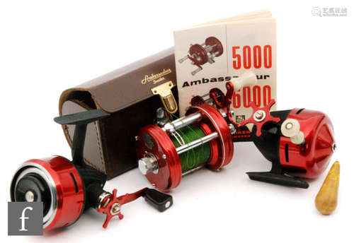 An ABU Ambassadeur 6000 multiplying bait casting reel with accessories in original leather case, also an Abu-Matic 60 closed face reel and an ABU 505 closed face reel. (3)