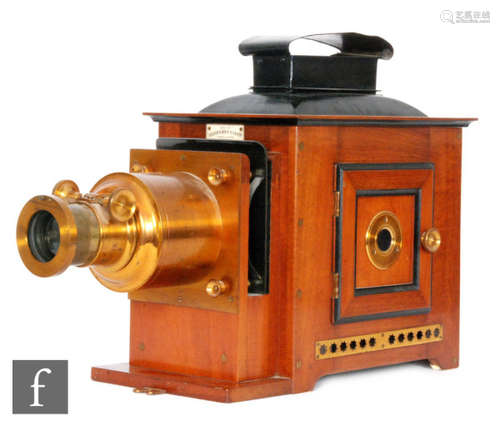 A 19th Century mahogany cased magic lantern by Perken Son & Co Ltd London, together with sets and lectures approximately eighty plus and three mechanical slides and frames. (qty)