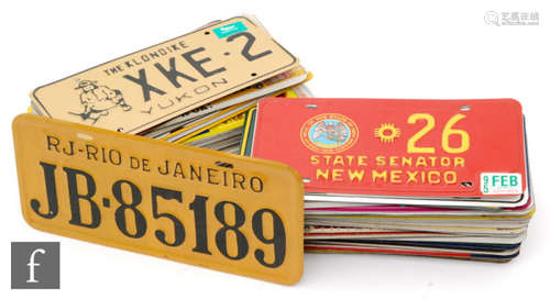 A collection of American licence number plates from the 1970s to include Hawaii, Louisiana, Missouri, Connecticut, etc. and two RAC plaques. (70)