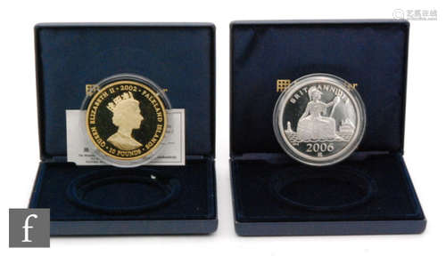 Elizabeth II - A ten pound silver proof Falklands Island coin to commemorate the Golden Jubilee with certificate, a similar Britannia 5oz 2006 issue for the 70th anniversary of the Spitfire, cased (2)