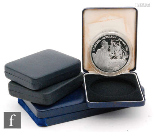 Elizabeth II - A twenty five pound silver proof coin for St Helena and Ascension, a silver proof medal for the Royal Commonwealth society and two silver proof twenty five dollar coins for Jamaica 1979, all cased with certificates (4)