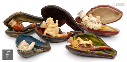 A collection of five late 19th to early 20th Century carved Meerschaum pipes, comprising an example formed as the infant Bacchus astride a bottle, two with running horses, an eagle claw example and a figural exampled formed as a bearded gentleman's head. (5)