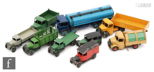 A collection of Dinky Toys diecast commercial vehicles, to include a Foden Tanker, Bedford Refuse Truck, Bedford End Tipper, etc. (9)