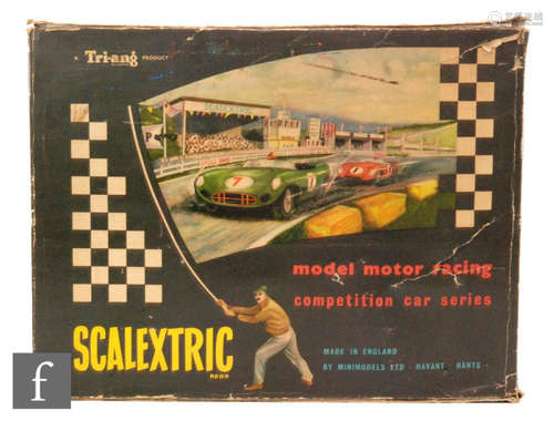 A Scalextric CM2 Competition Car set comprising two C55 Vanwall cars, one in yellow with RN 14, one in red with RN 11 with track, fences and controllers.