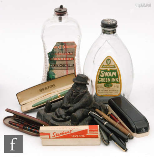 A Parker 51 black cased fountain pen, a Stephens No 106, a Conway Stewart, a Stephens leverless No106, boxed, a Watermans W3, boxed, a Conway Stewart 75, a Wyvern model, seven other pens, a Swan green ink bottle, a Stephens ink bottle and a cast ink stand modelled as Daniel Lambert (qty)