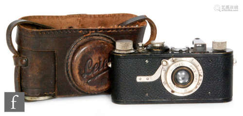 A Leica model 1a camera serial number 32019 with Letz Elmar1:3,5 F=50mm lens in fitted part brown leather case with a cased Excelsior light meter (2)