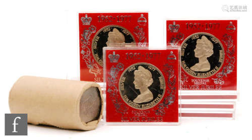 Elizabeth II - Ten 1977 cased proof Silver Jubilee coins and a roll of 1972 crowns. (qty)