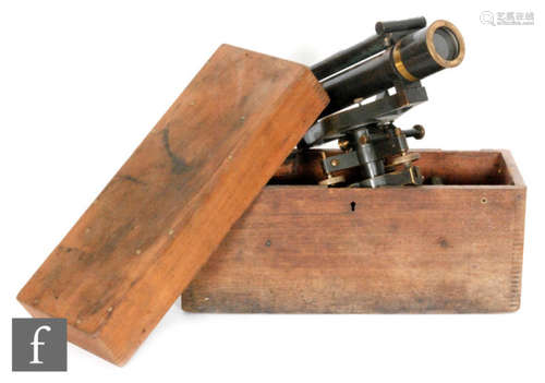 An early 20th Century lacquered brass theodolite, unnamed, length 34cm, boxed