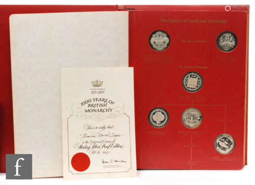 An album of forty three silver coins to commemorate The Kings and Queens of England, No 564 with certificates (43)