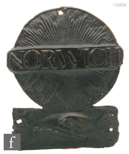 A Norwich Union tinned iron fire mark, sunburst above clasped hands (W29F), height 20cm