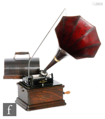 An Edison Fireside phonograph, serial No 13685 4 to 2 minute play with combination model reproducer with original fireside horn and crane in oak case on plinth base, width 29cm