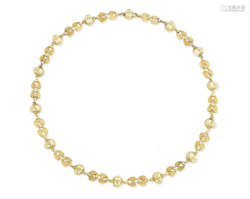 An early 20th century fancy-link gold necklace, by S. J. Phillips