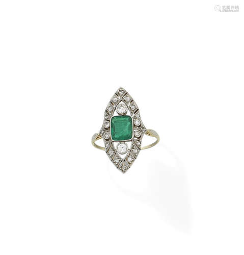 An emerald and diamond ring