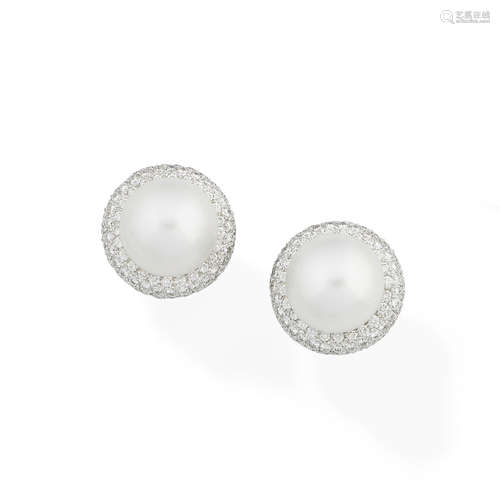 A pair of pearl and diamond earclips