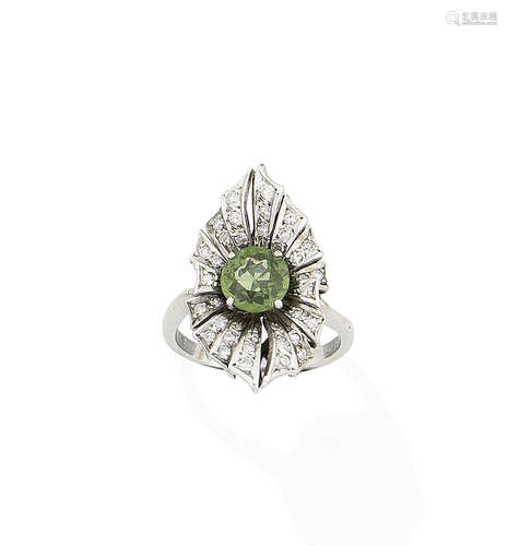 A green sapphire and diamond dress ring