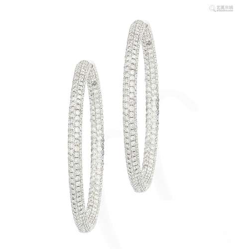 A pair of diamond hoop earrings